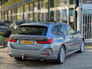 BMW 3 Serie BMW 3-serie Touring 320e Nieuwstaat AUT Pano Plug in hybrid Wide screen Elek.Trekhaak Stoelverwarming Adaptive LED - afbeelding nr 30